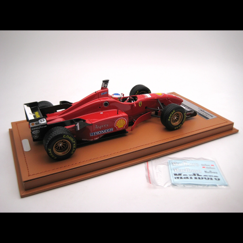 FERRARI F310 N.1 SPAIN GP 1996 RAIN TYRES M.SCHUMACHER + DRIVER 1:18 Tecnomodel Formula 1 Modellino