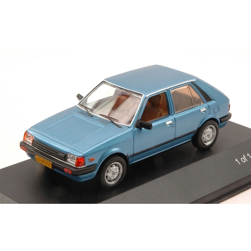 MAZDA 323 HATCHBACK 1982 METALLIC BLUE 1:43 Whitebox Auto Stradali Modellino