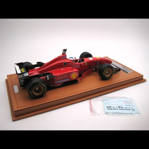 FERRARI F310 N.1 SPAIN GP 1996 RAIN TYRES M.SCHUMACHER + DRIVER 1:18 Tecnomodel Formula 1 Modellino